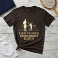 Tennis dad T‑Shirt — “Every Champion Starts With Someone Who Believes”