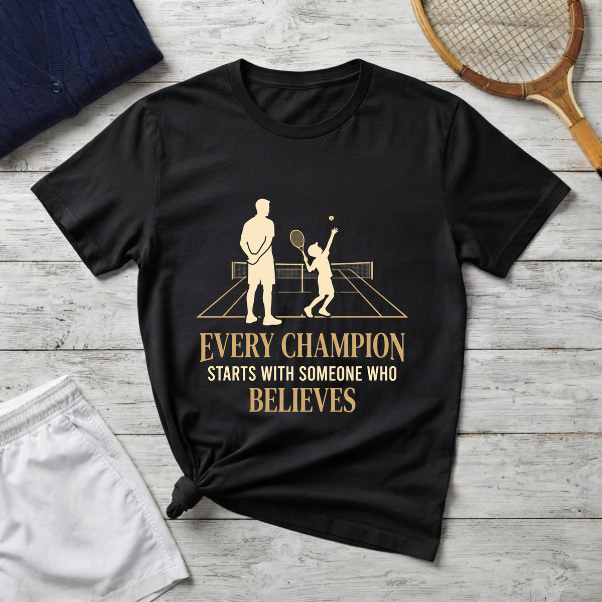 Tennis dad T‑Shirt — “Every Champion Starts With Someone Who Believes”